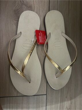 Havaianas Slim Flip Flops in Beige with Gold Straps